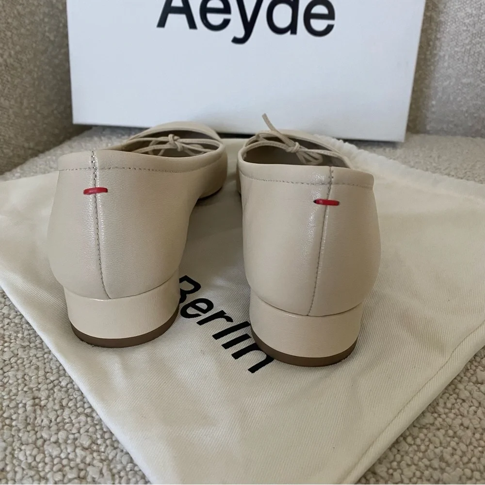 Aeyde Darya bow-detailed glossed-leather ballet flats Italian size 38